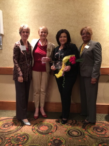 Chairman's Award presented to Jessica Narvaez (third from left) from Pinnacle Resources with Lynda Rhodes, Pauline Shirley, and Mary Boyd (left to right) from WOVI, Inc.